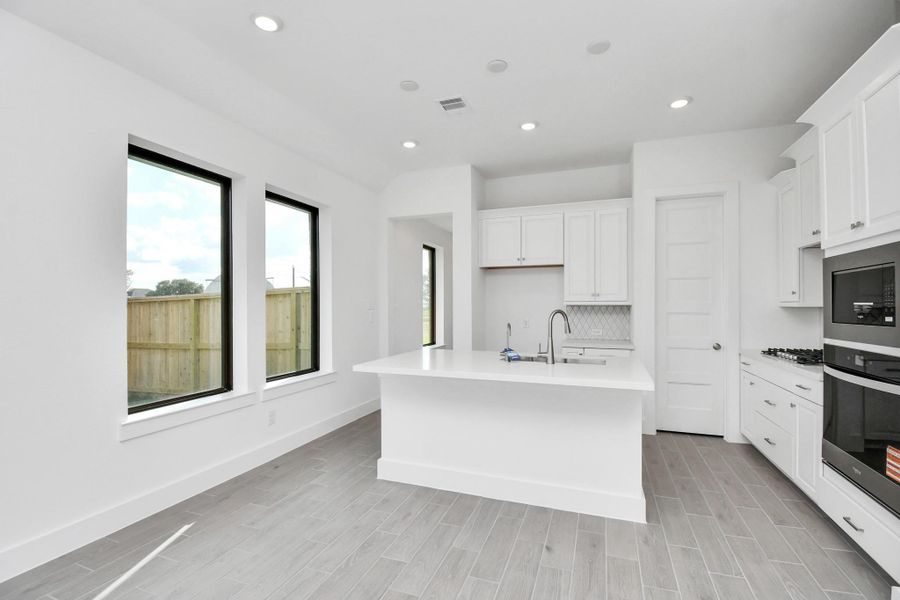 Furnished interior view inside a new home in Arabella on the Prairie: Signature Collection, Richmond (Image 11).
