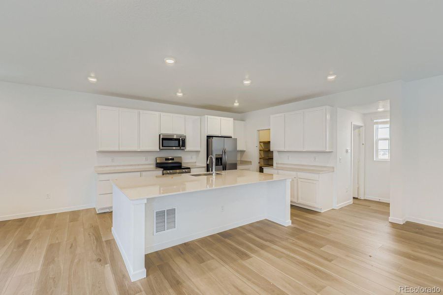 Furnished interior view inside a new home in Parterre: The Skyline Collection, Thornton (Image 5).
