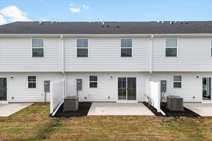 Exterior details and patio area of a home in Canterbrook Farms, Fountain Inn (Image 3).