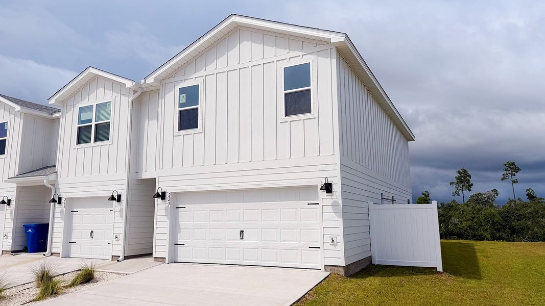 Front exterior of a new home in Salt Creek Townhomes at Mexico Beach, Mexico Beach, FL, highlighting curb appeal (Image 16).
