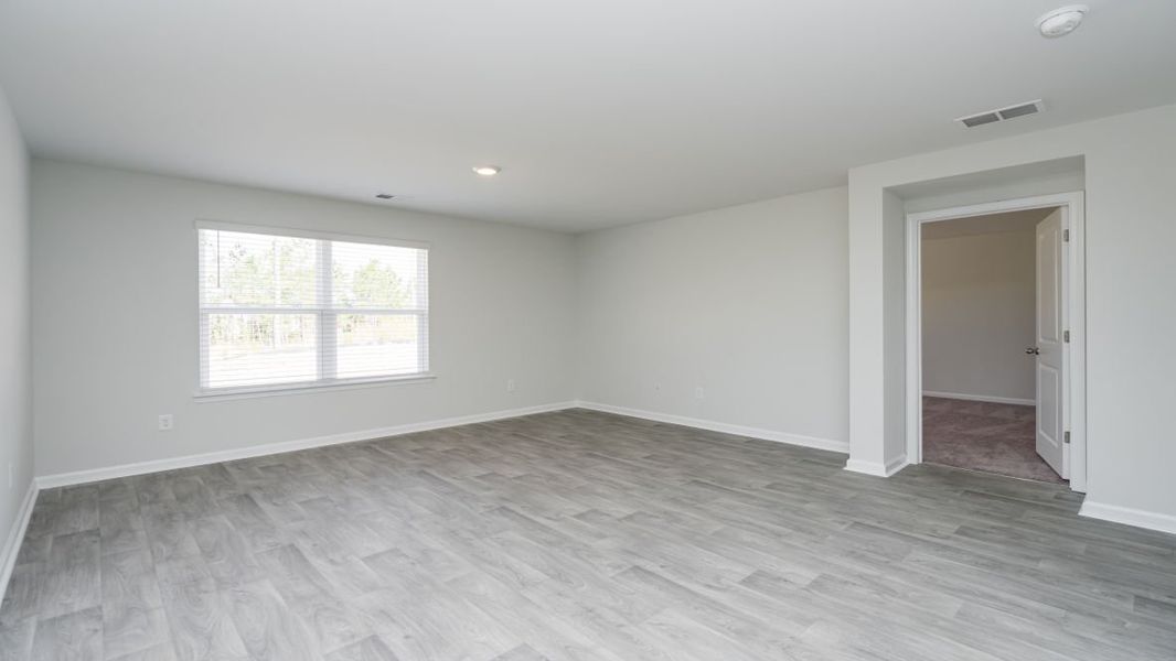 Representative unfurnished interior of a home built from the Cali by D.R. Horton in Jordanville Farms, Galivants Ferry (Image 27).