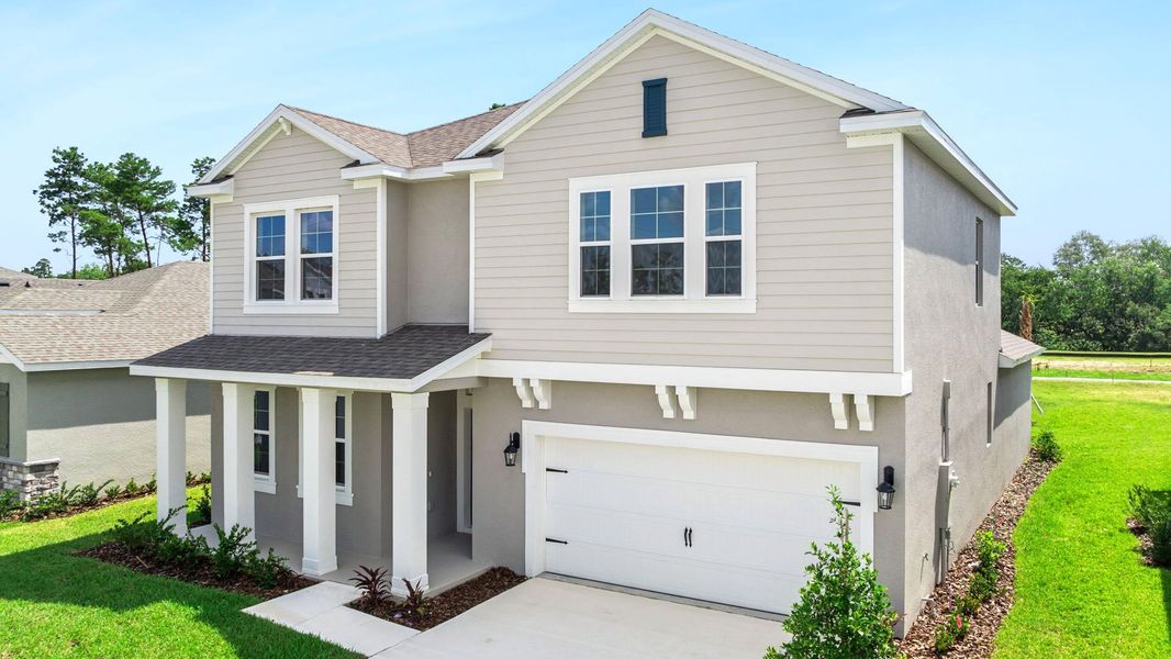 Representative exterior photo of a completed home built from the Portland by D.R. Horton in Archers Mill, Ormond Beach, FL (Image 2). Representative exterior photo of a completed home built from the Portland by D.R. Horton in Archers Mill, Ormond Beach, FL (Image 2).