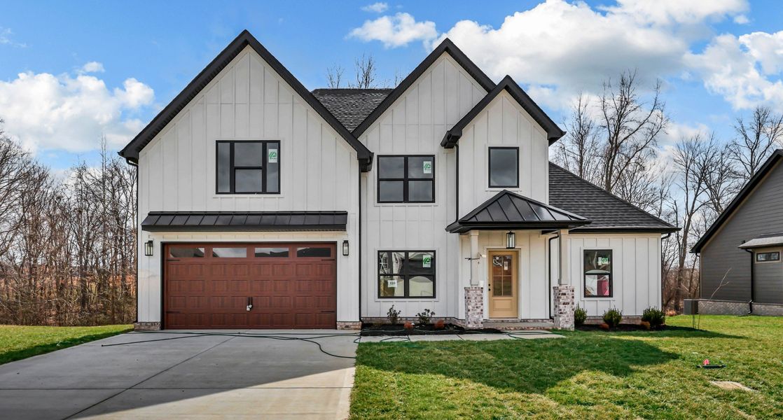 Front exterior of a new home in Bellshire, Clarksville, TN, highlighting curb appeal (Image 2). Front exterior of a new home in Bellshire, Clarksville, TN, highlighting curb appeal (Image 2).