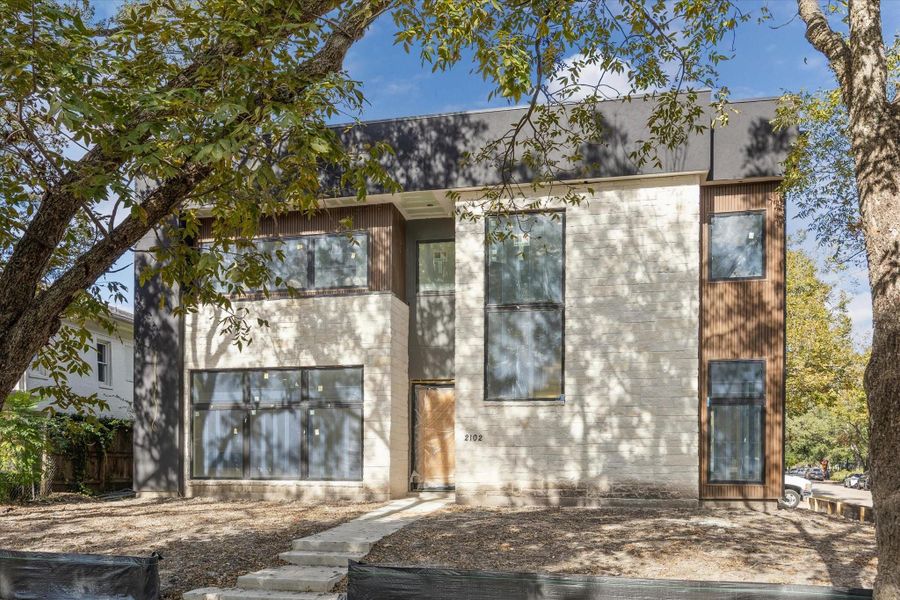 Front exterior of a new home in , Houston, TX, highlighting curb appeal (Image 1).