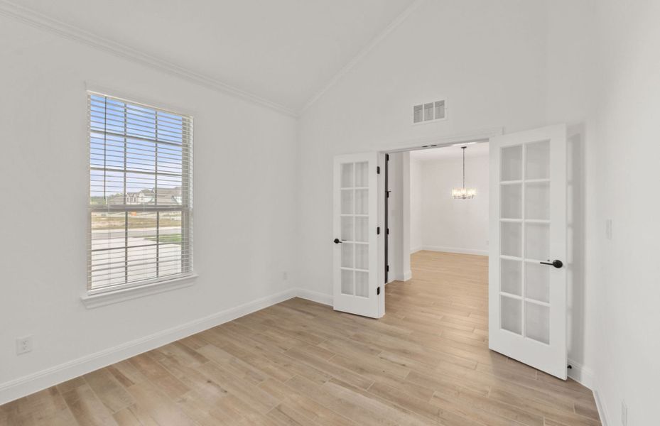 Representative unfurnished interior of a home built from the Wallace by Pulte Homes in Bluffview Reserve, Leander (Image 13).