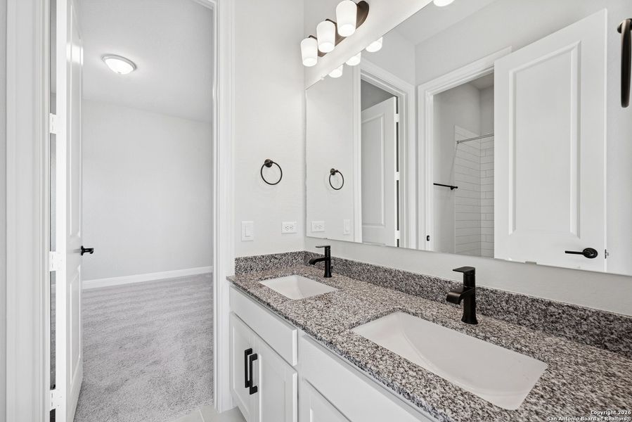 Furnished interior view inside a new home in Windsong - Legacy Series, Boerne (Image 17).