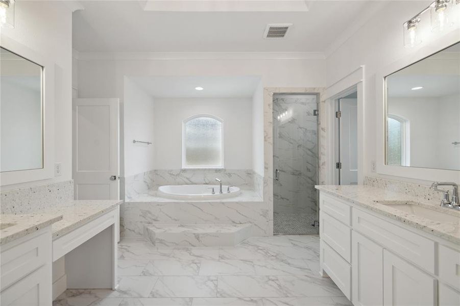 Bathroom featuring vanity, tile patterned floors, shower with separate bathtub, and crown molding