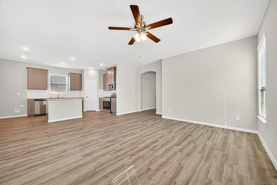 Spacious, unfurnished interior of a new home in Sunterra, Katy (Image 24).