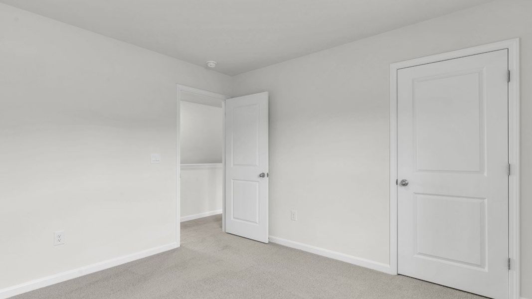 Spacious, unfurnished interior of a new home in The Preserve at Kinsley, Jamestown (Image 15). Spacious, unfurnished interior of a new home in The Preserve at Kinsley, Jamestown (Image 15).