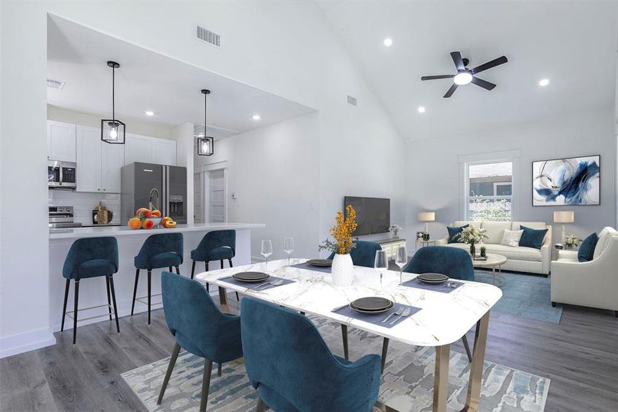 Open-concept living space with vaulted ceiling - virtual staging