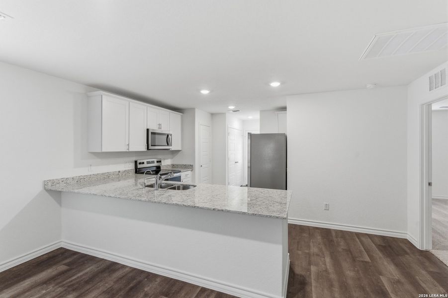 Furnished interior view inside a new home in Vista Real, Converse (Image 7).