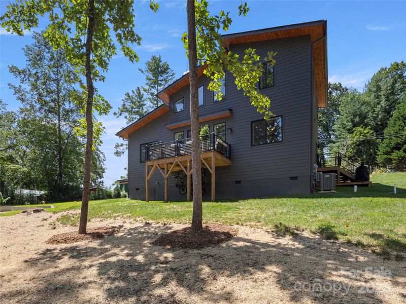 Front exterior of a new home in , Hendersonville, NC, highlighting curb appeal (Image 18).