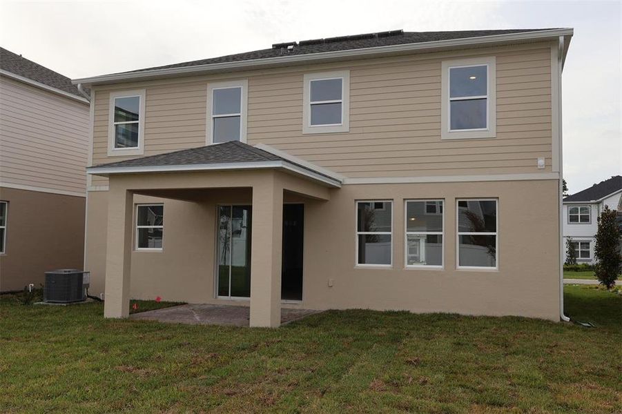 Exterior details and patio area of a home in Estates at Rivercrest, Sanford (Image 3). Exterior details and patio area of a home in Estates at Rivercrest, Sanford (Image 3).