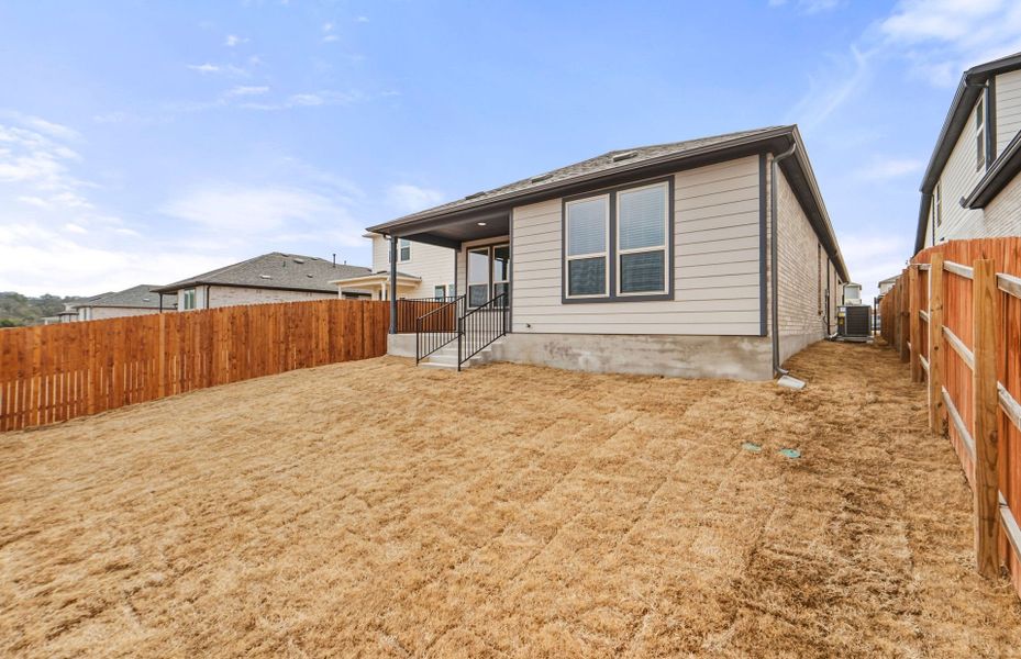 Exterior details and patio area of a home in Saddleback at Santa Rita Ranch, Liberty Hill (Image 4).