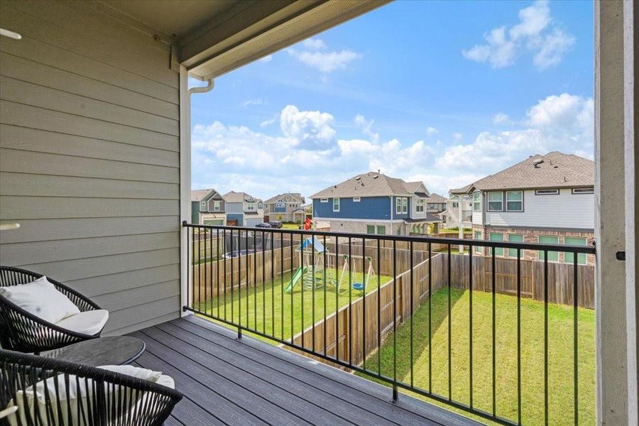Exterior details and patio area of a home in Meridiana, Iowa Colony (Image 3).