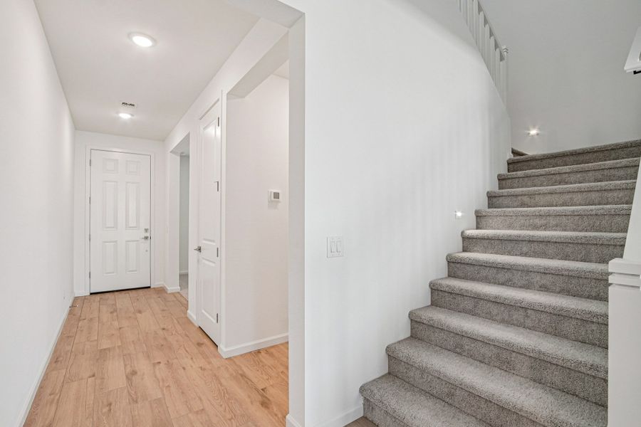 Stairs to second floor. Finishes and options may vary by community
