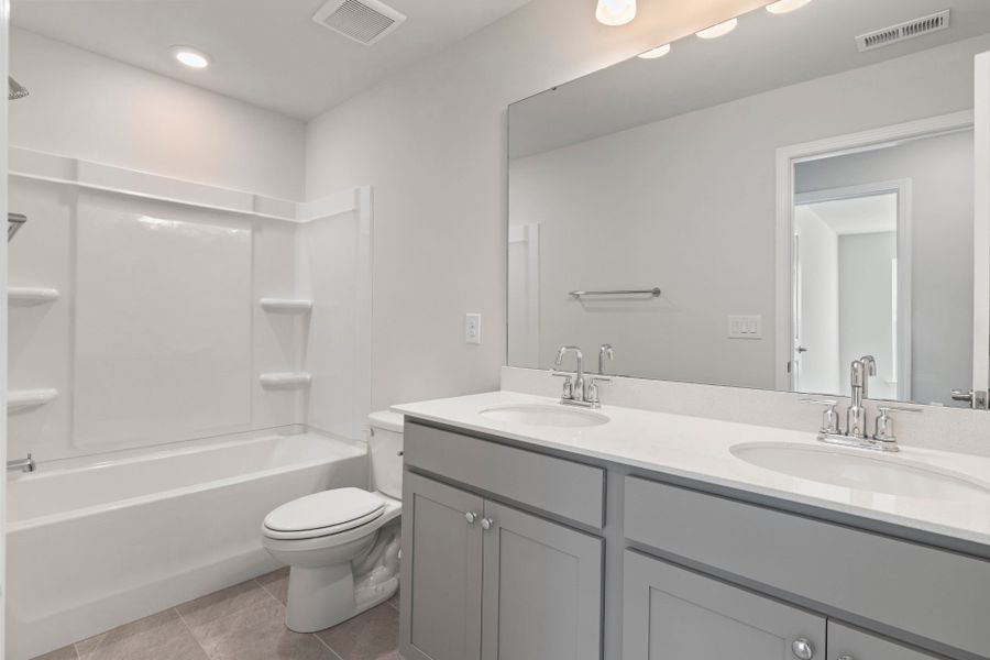 Furnished interior view inside a new home in Poets Walk, Whitsett (Image 8).