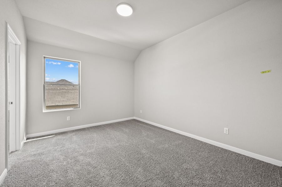 Bedroom in the Willow home plan by Trophy Signature Homes – REPRESENTATIVE PHOTO