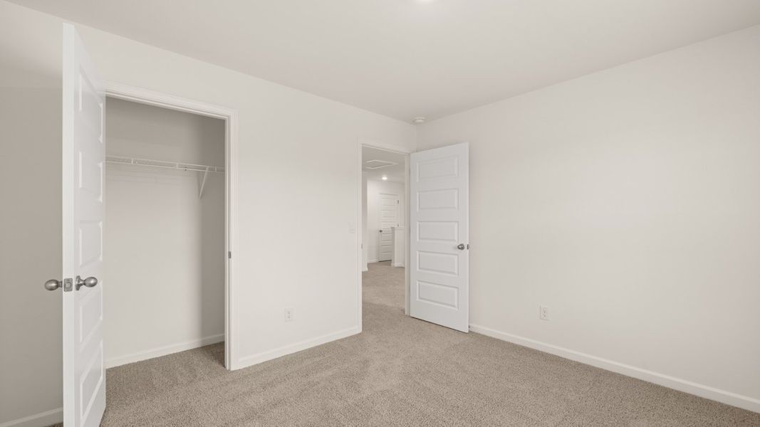 Representative unfurnished interior of a home built from the Hanover by D.R. Horton in The Reserve at Calcutta, Stockbridge (Image 20).