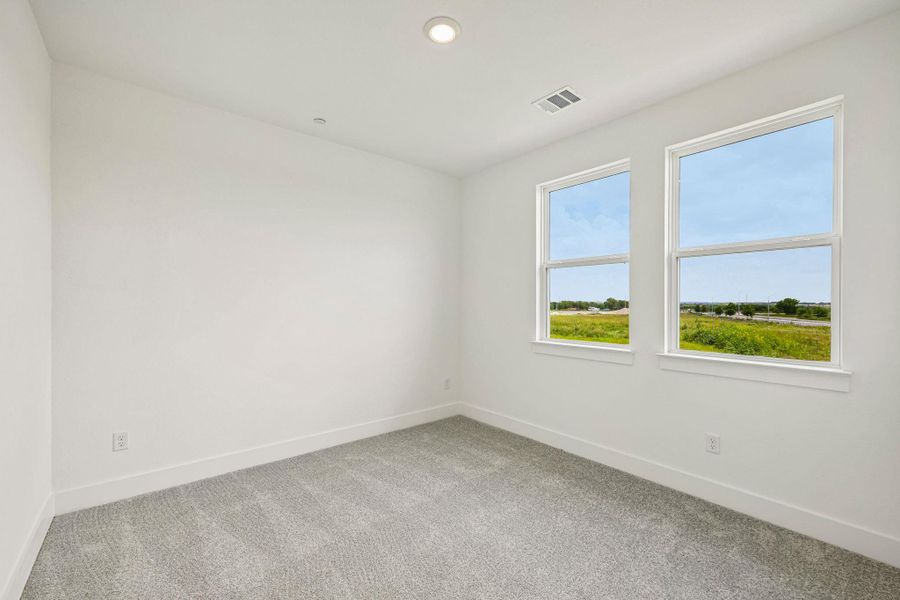Spacious, unfurnished interior of a new home in Avery Centre, Round Rock (Image 37).