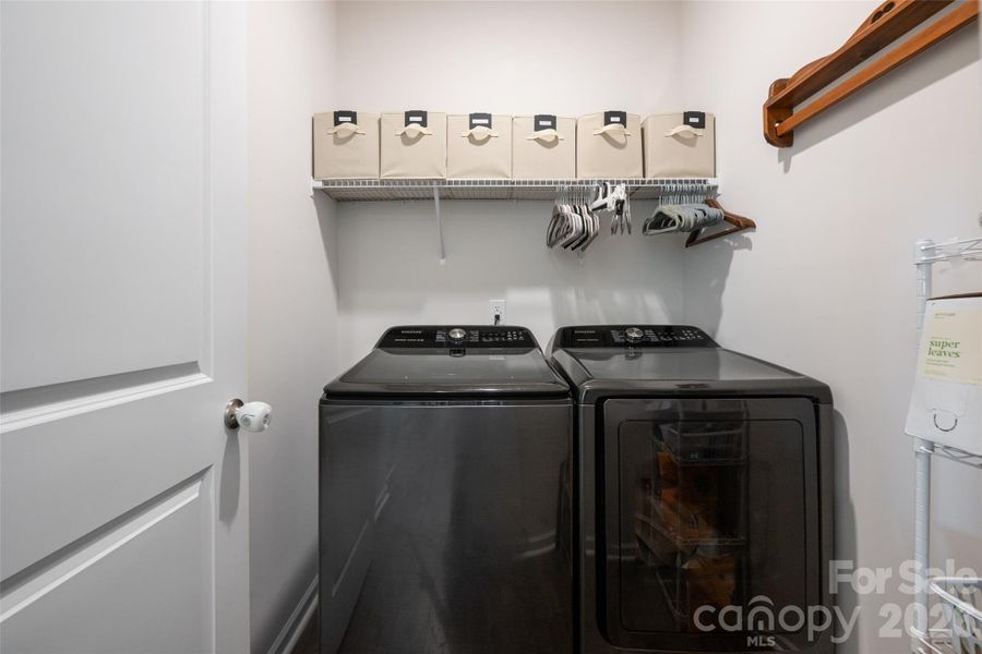 Laundry room with extra storage closet Laundry room with extra storage closet