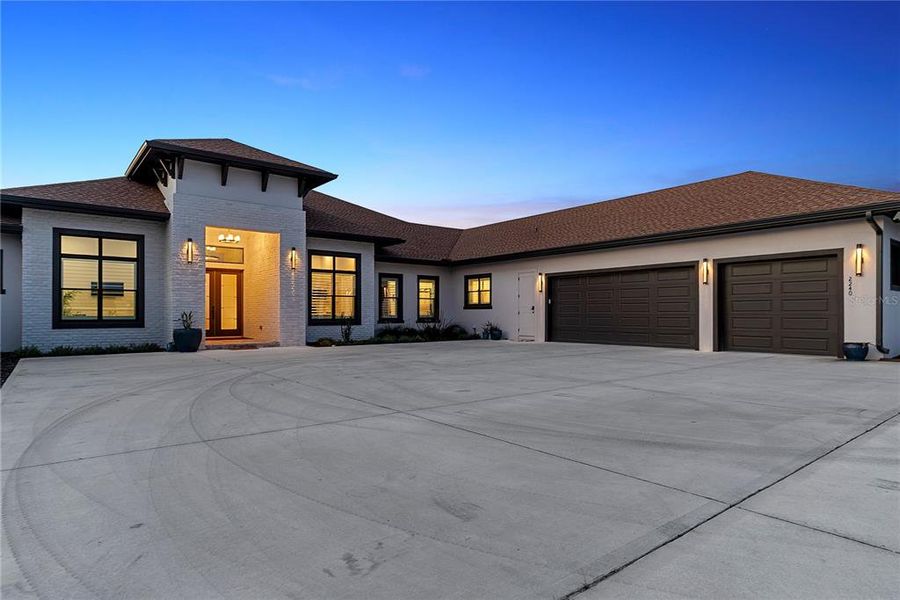 Front exterior of a new home in , Oviedo, FL, highlighting curb appeal (Image 26). Front exterior of a new home in , Oviedo, FL, highlighting curb appeal (Image 26).