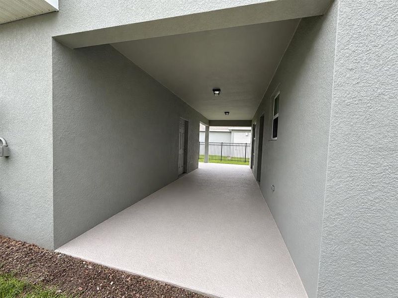 Exterior details and patio area of a home in Winding Meadows, Apopka (Image 25).