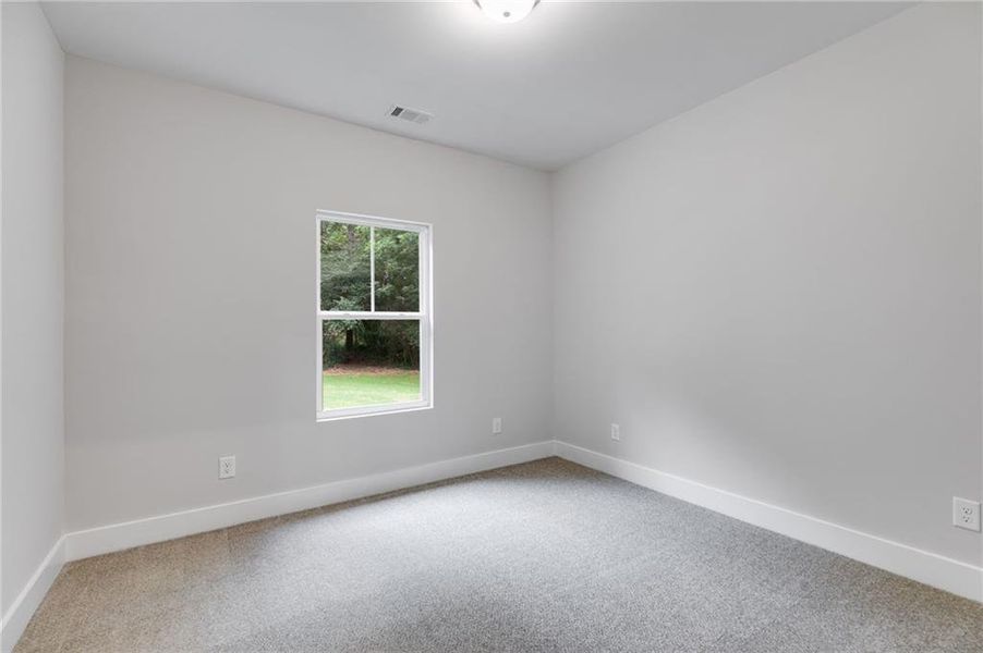 Spacious, unfurnished interior of a new home in , Carrollton (Image 8).