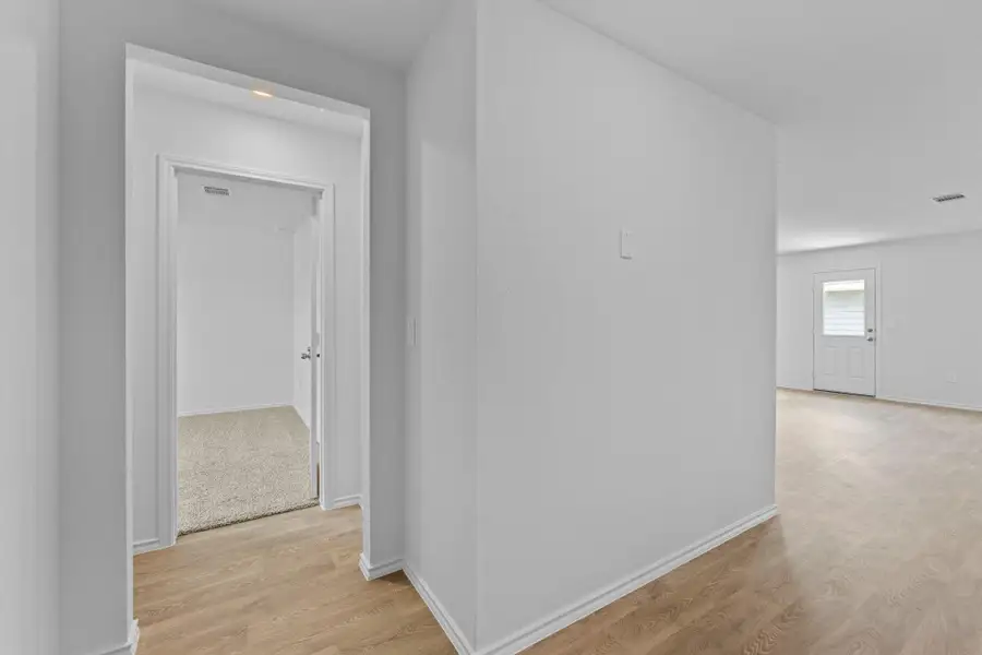 Spacious, unfurnished interior of a new home in Prairie Lakes, Buda (Image 13). Spacious, unfurnished interior of a new home in Prairie Lakes, Buda (Image 13).
