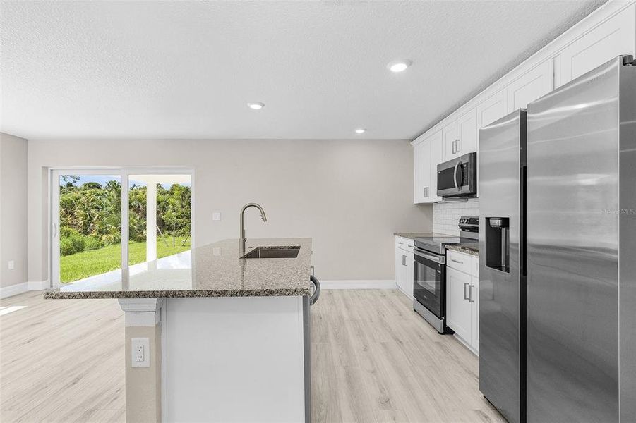 Furnished interior view inside a new home in , North Port (Image 6).