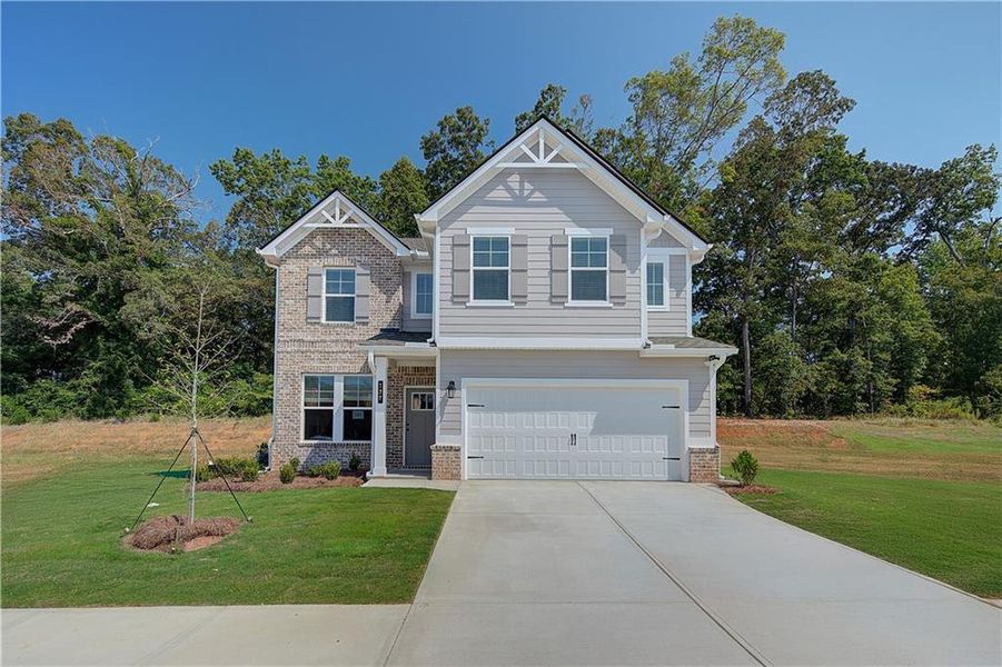 Front exterior of a new home in Westminster, Covington, GA, highlighting curb appeal (Image 2).