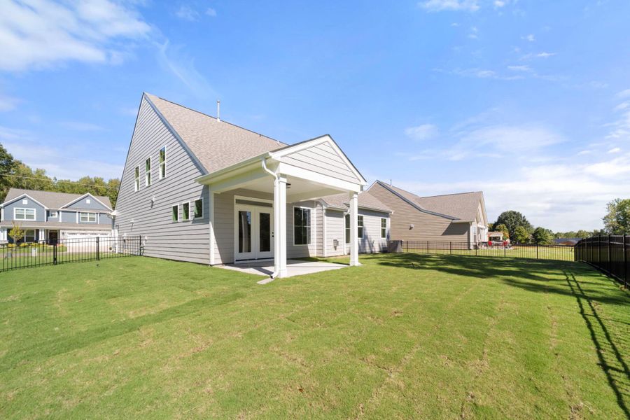 Exterior details and patio area of a home in Fiddler's Ridge, Advance (Image 3).
