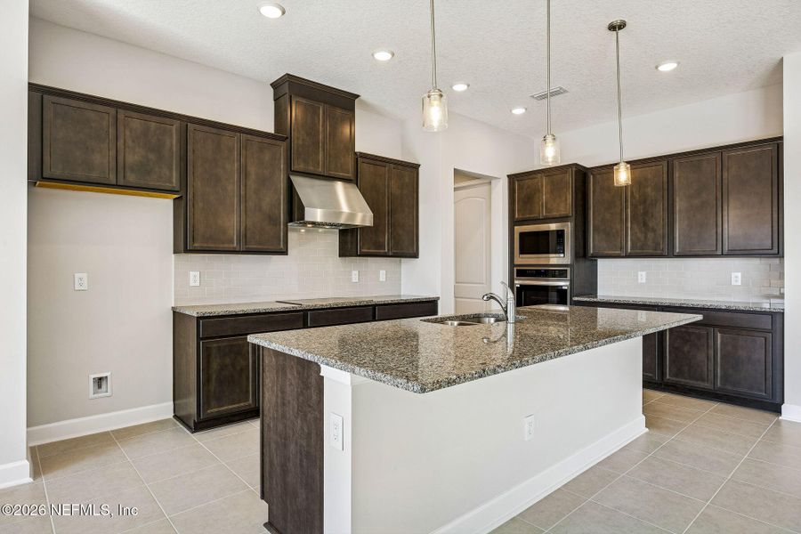 Furnished interior view inside a new home in Sandy Ridge, Yulee (Image 5).