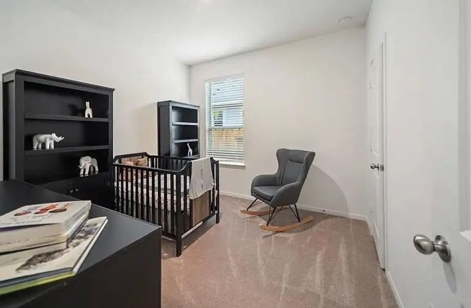 Furnished interior view inside a new home in The Pines At Seven Coves, Conroe (Image 9).