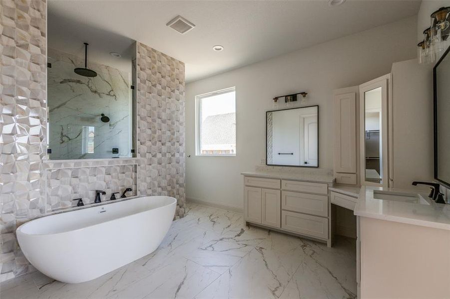 Bathroom with vanity and plus walk in shower