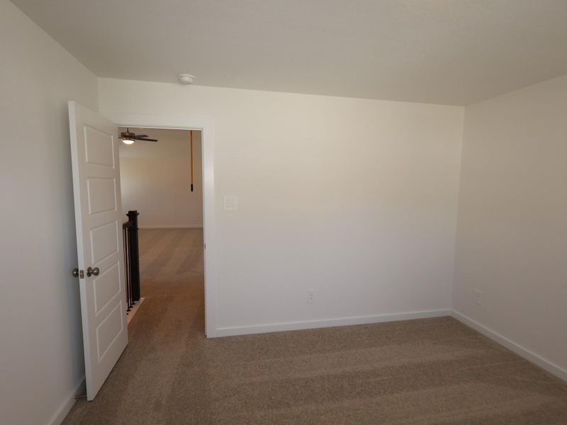 Spacious, unfurnished interior of a new home in Pinewood at Grand Texas, New Caney (Image 6).