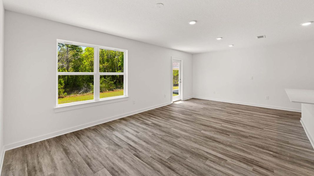 Spacious, unfurnished interior of a new home in Magnolia at the Bluffs Phase 3, Freeport (Image 14).
