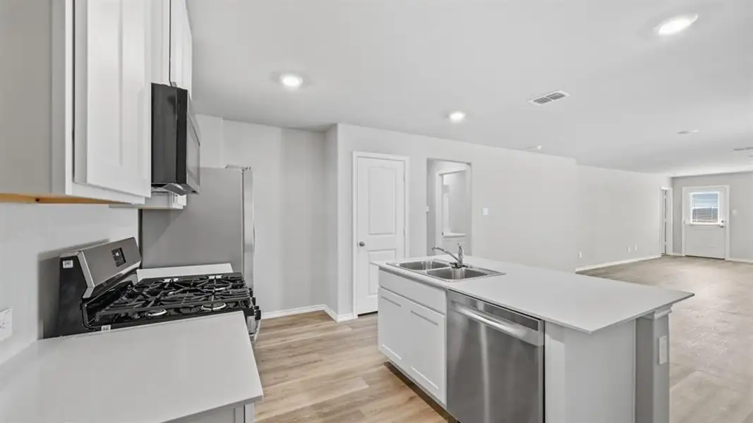 Furnished interior view inside a new home in Sunnycreek, Crowley (Image 6).