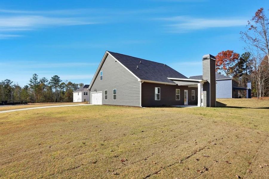 Exterior details and patio area of a home in The Woodlands Preserve, Jackson (Image 4). Exterior details and patio area of a home in The Woodlands Preserve, Jackson (Image 4).