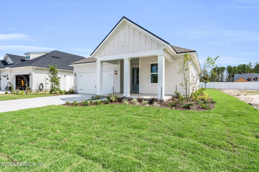 Front exterior of a new home in , Jacksonville, FL, highlighting curb appeal (Image 1). Front exterior of a new home in , Jacksonville, FL, highlighting curb appeal (Image 1).