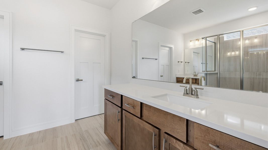 Representative furnished interior of a home built from the Paloma by Brightland Homes in Bridgeland Central, Cypress (Image 19).