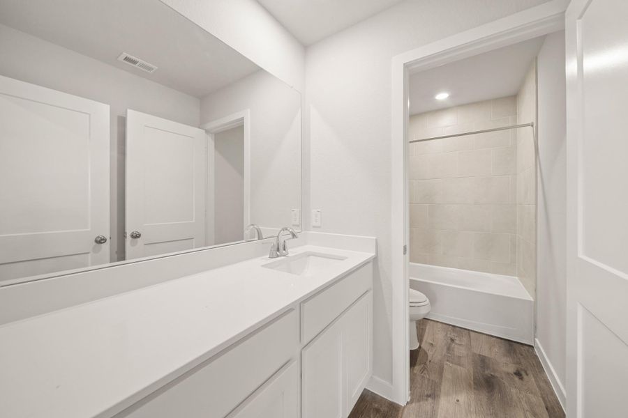Furnished interior view inside a new home in Pearlbrook, Texas City (Image 9).