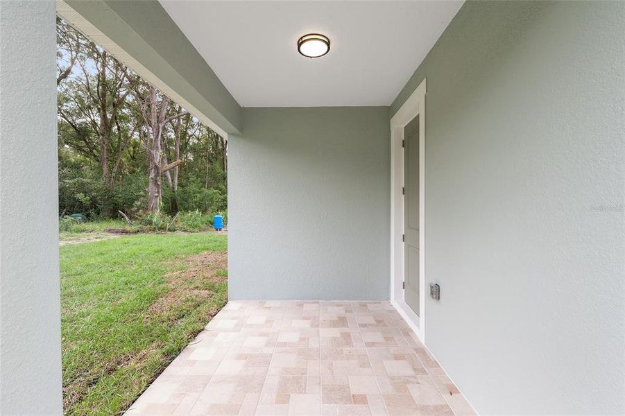 Exterior details and patio area of a home in , Summerfield (Image 31). Exterior details and patio area of a home in , Summerfield (Image 31).
