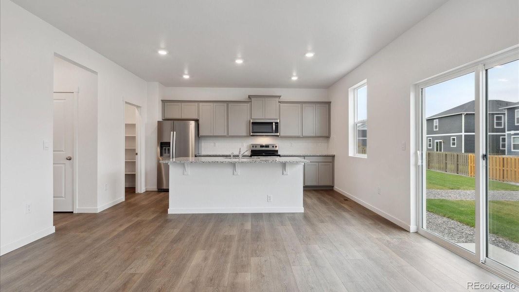 Furnished interior view inside a new home in Silver Peaks, Lochbuie (Image 9).