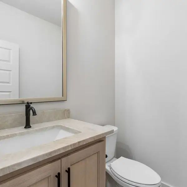 Furnished interior view inside a new home in StarView, Prosper (Image 39).