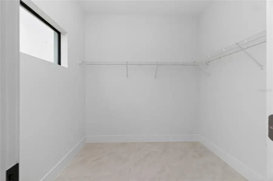 Spacious, unfurnished interior of a new home in , Port Charlotte (Image 51).