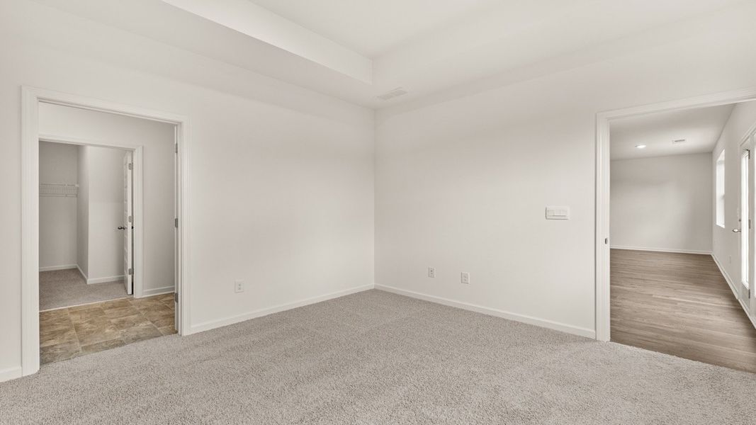 Representative unfurnished interior of a home built from the Macon by D.R. Horton in Poplar Preserve, Newnan (Image 13).