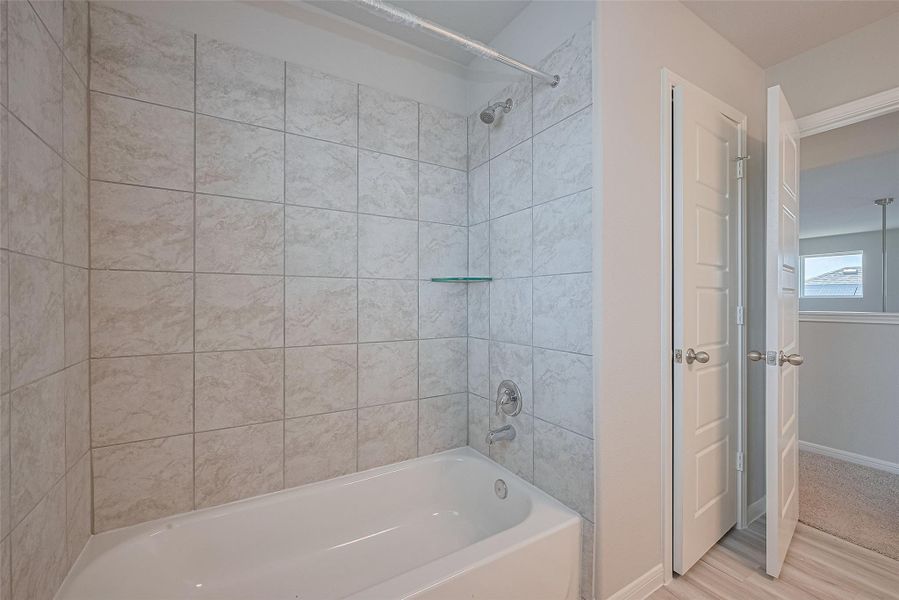 Furnished interior view inside a new home in Sunterra, Katy (Image 10).