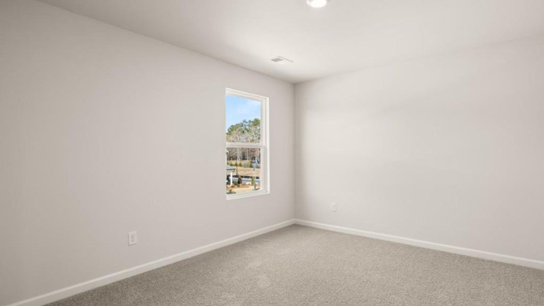 Spacious, unfurnished interior of a new home in Fairway 17 at Mirror Lake, Villa Rica (Image 10).
