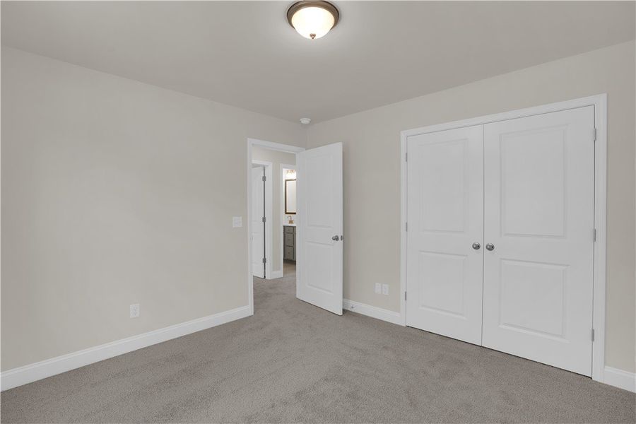 This cozy bedroom offers a serene retreat with sof This cozy bedroom offers a serene retreat with sof